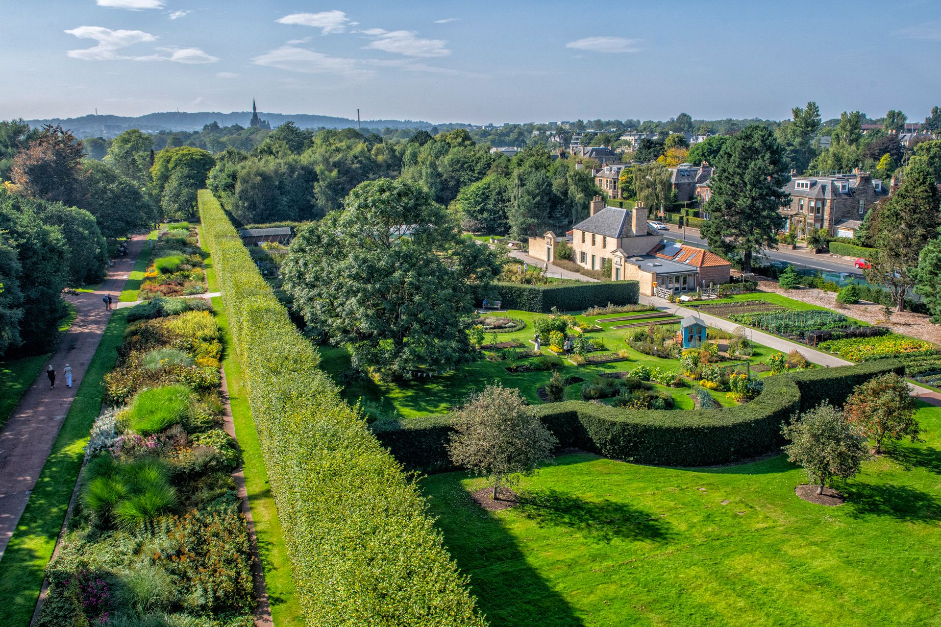 An overhead view of the Royal Botanic Garden Edinburgh, with the city in the background 