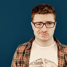 A headshot of Ben Holden