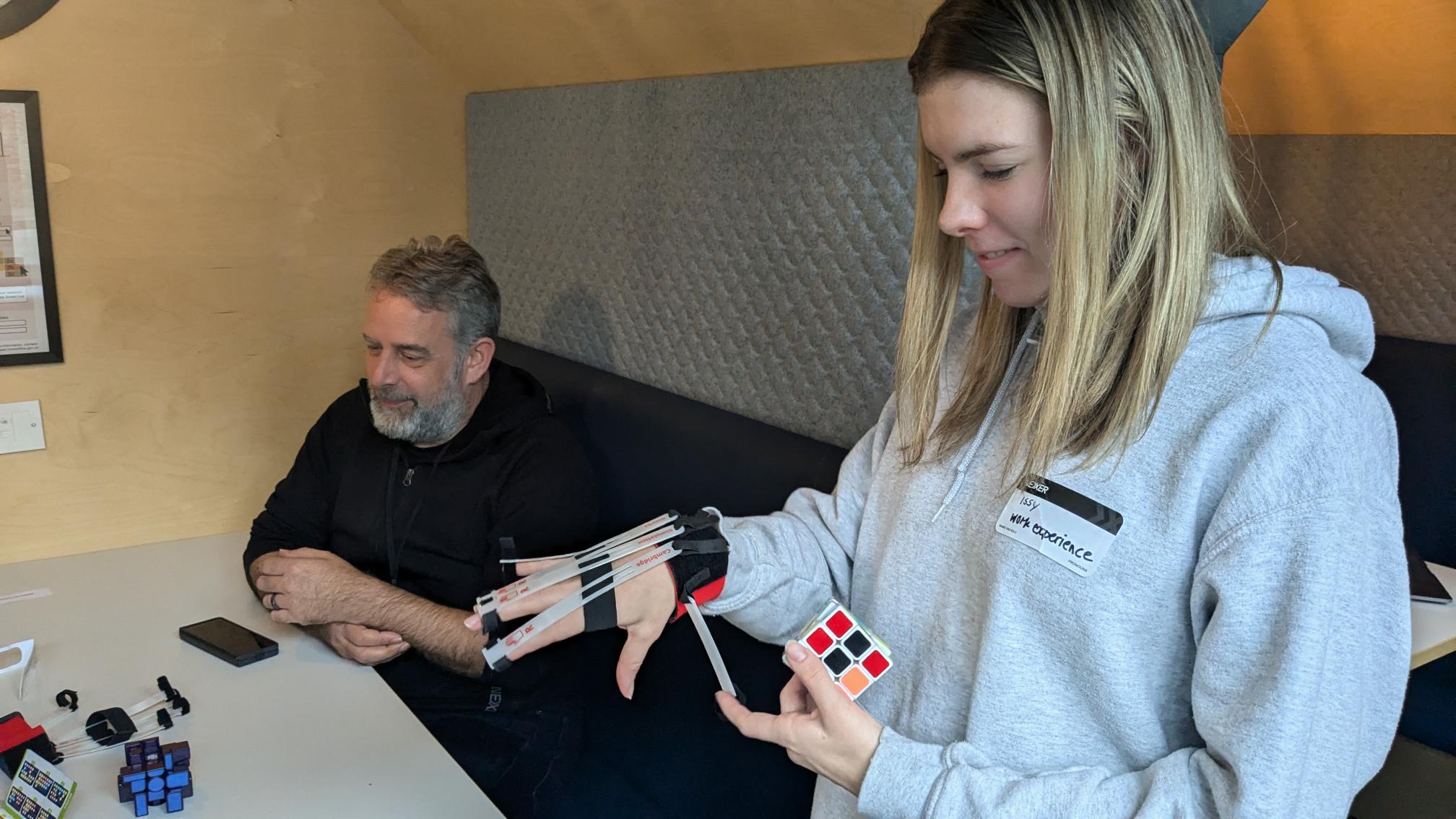 Issy tries out the Cambridge Simulation Gloves, which provide insight into how limitations in hand movement can affect product use