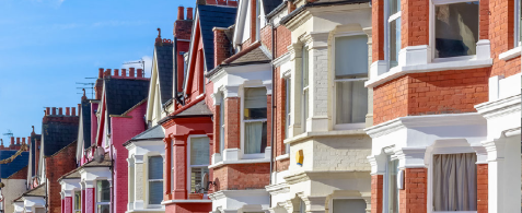 A line of colourful houses in a terrace